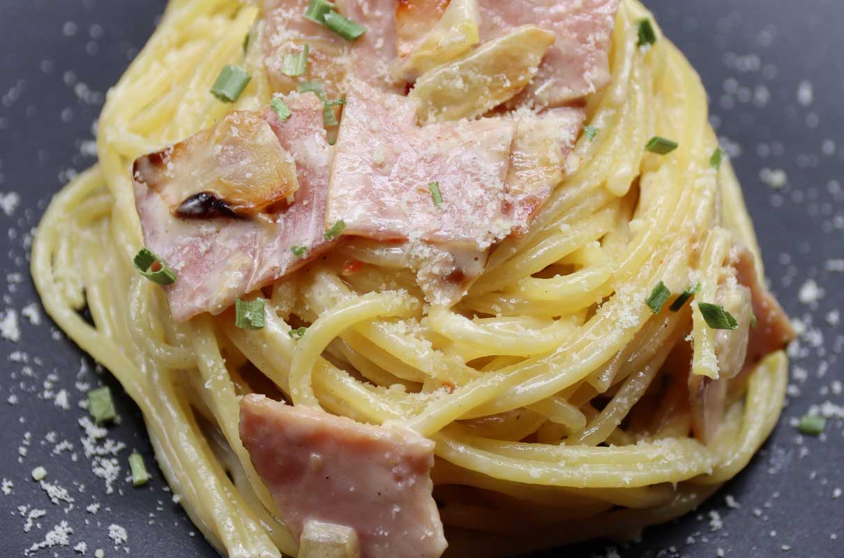 Rezept: Köstliche Pasta mit Schinken und Zwiebeln